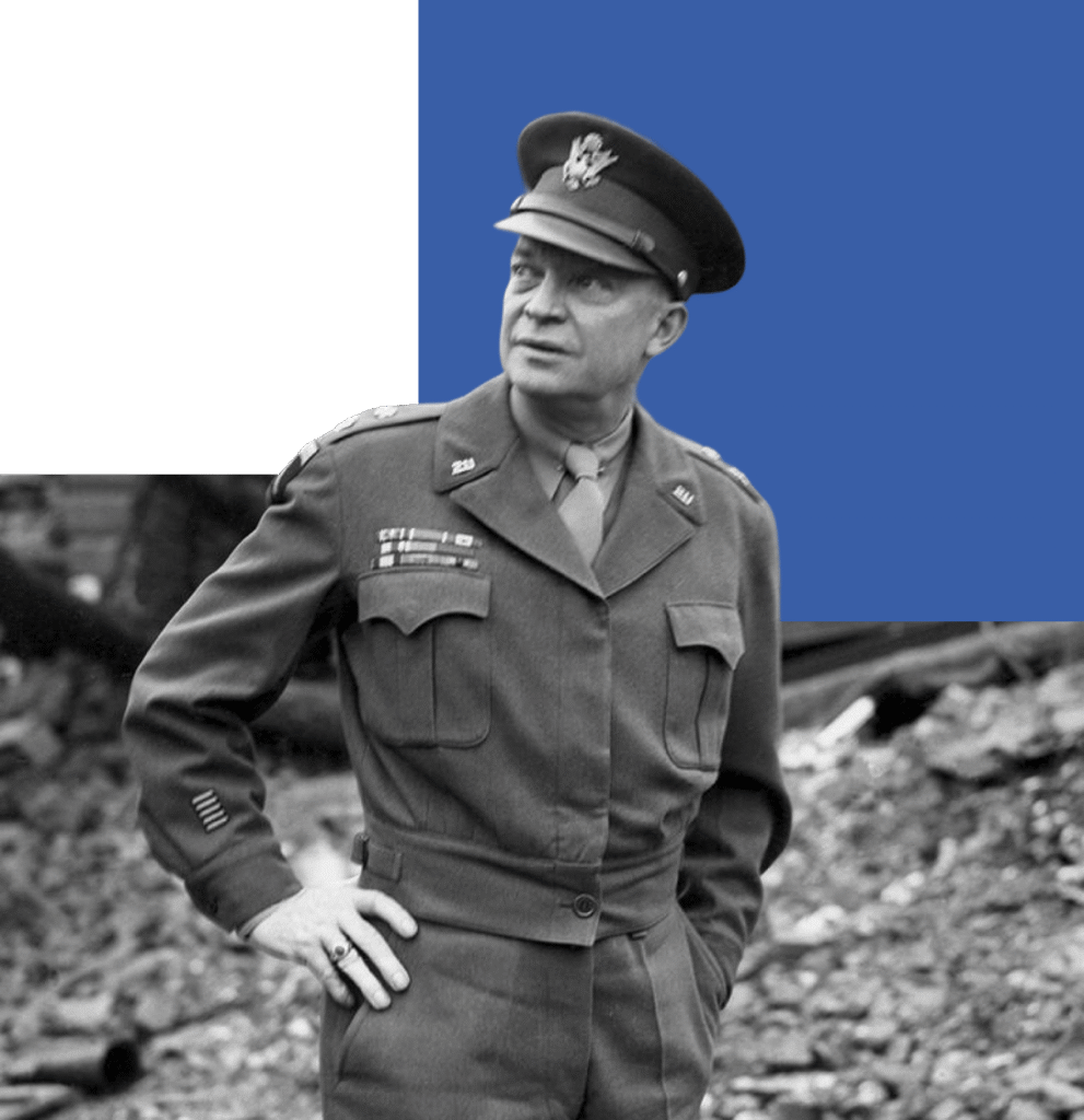 Dwight D. Eisenhower in military uniform standing outdoors.
