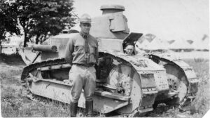 This is a photograph of Lieutenant Colonel Dwight D. Eisenhower, who would become the 34th United States President, standing in front of a tank at Fort Meade, Maryland.