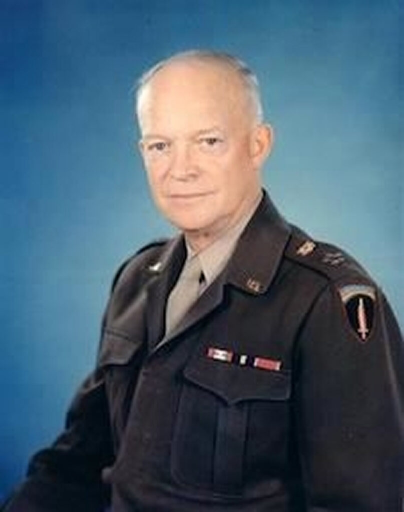 Dwight D. Eisenhower in military uniform, looking directly at the camera.