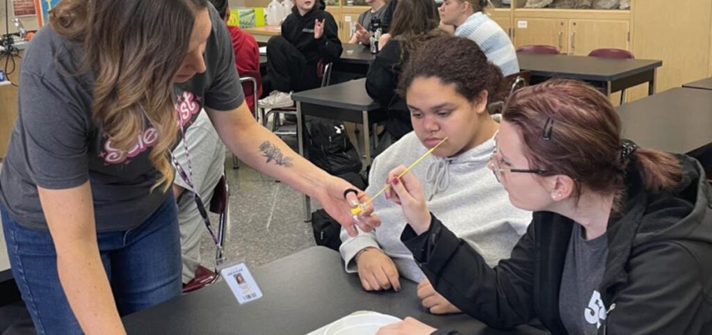 Students working together on a classroom activity.