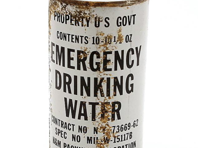 Government emergency drinking water container labeled for civil defense use.