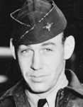 Close-up portrait of a serviceman wearing a military cap.