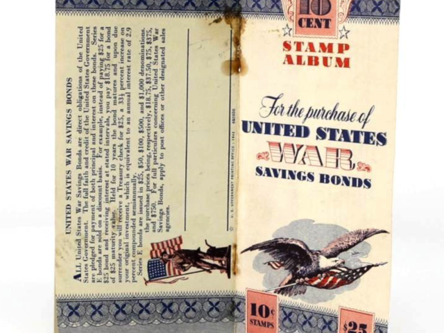 Ten-cent United States war savings bond stamp featuring a soldier carrying a flag.