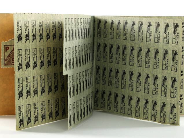 Rows of unused ration stamps inside United States War Ration Book Three.