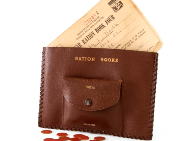 Brown leather ration-book wallet holding wartime ration books and paper documents.