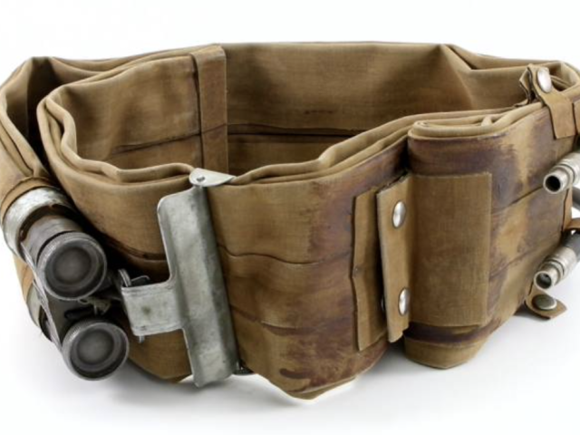 Brown military flotation belt with multiple padded compartments.