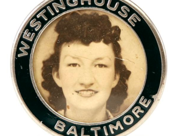 Westinghouse employee identification badge featuring a woman’s portrait.