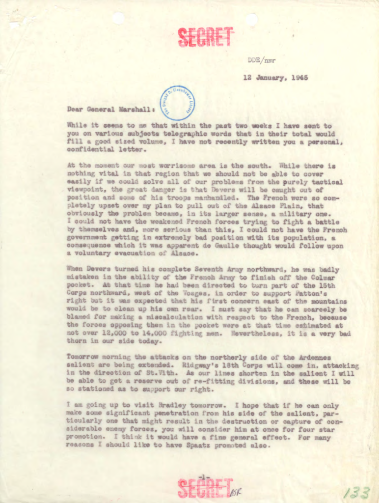 Aged typewritten letter with an official stamp.