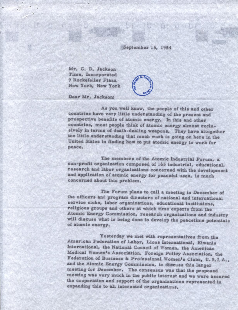 Blue-tinted typewritten letter with an official stamp.
