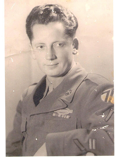 Young serviceman shown in a faded military portrait.