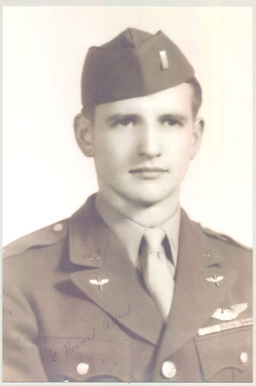 Young serviceman wearing a military uniform and garrison cap.
