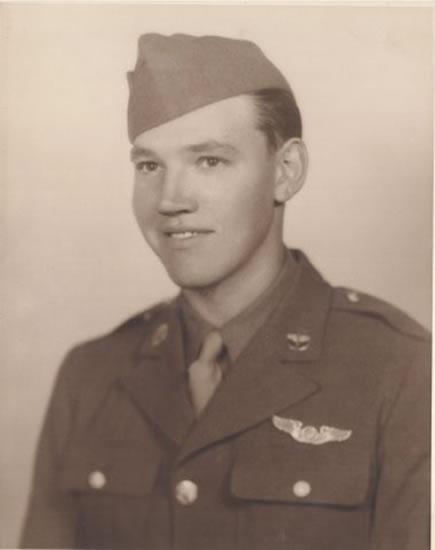 Young serviceman wearing a U.S. Army uniform and garrison cap.