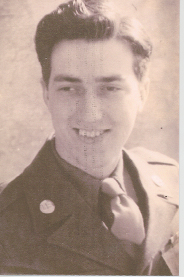 Smiling Marlin L. Ames shown in a formal portrait.