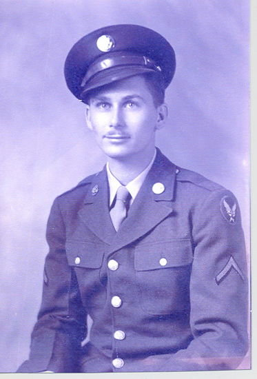 Young serviceman wearing a military uniform and garrison cap.