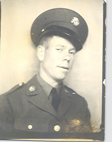 Robert Bissell wearing a military uniform and peaked cap.