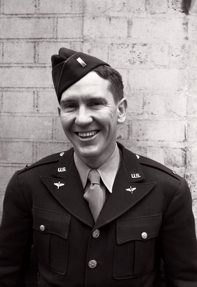 Smiling Burgess Meredith wearing a U.S. Army uniform and garrison cap.