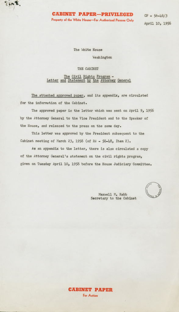 Scanned cabinet paper with centered typed text and an official stamp.