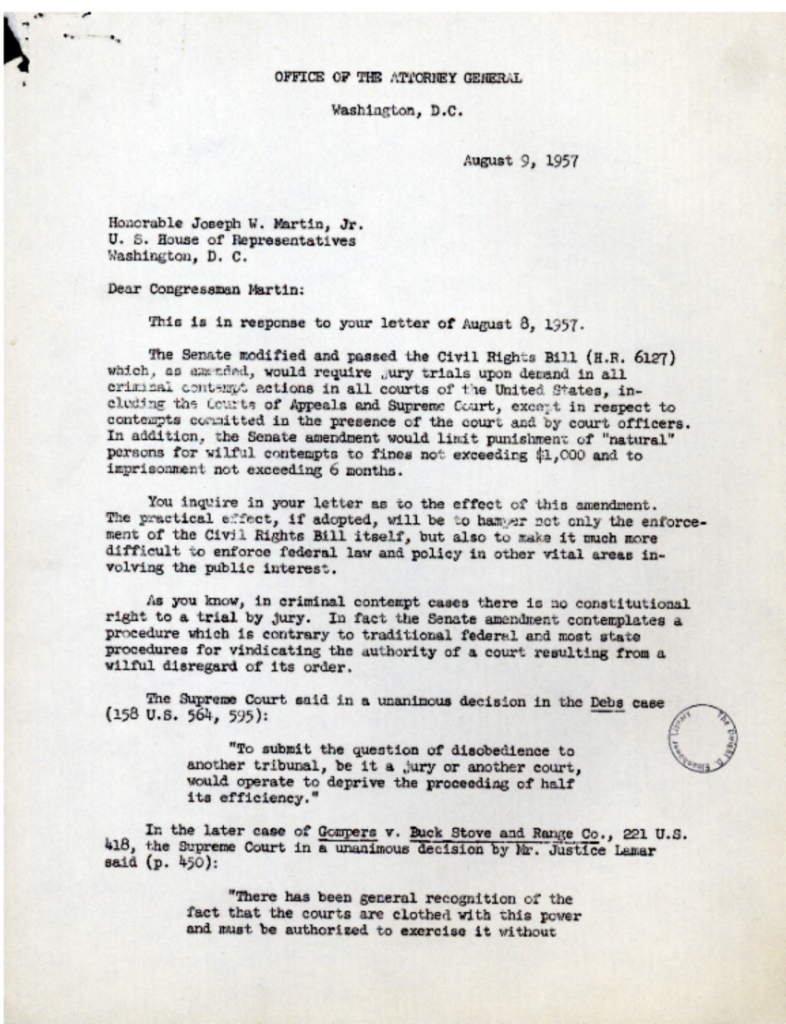 Aged typewritten letter with an official stamp.