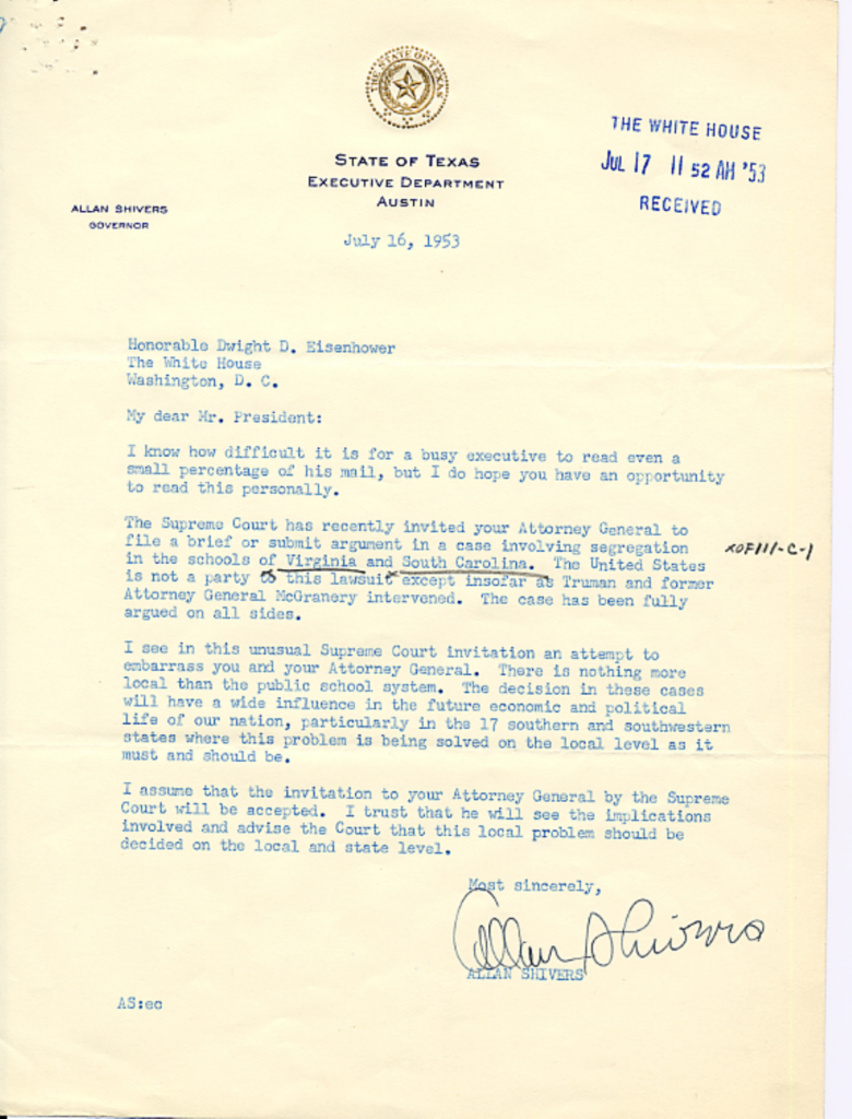 Aged typewritten letter with blue stamps and a signature.