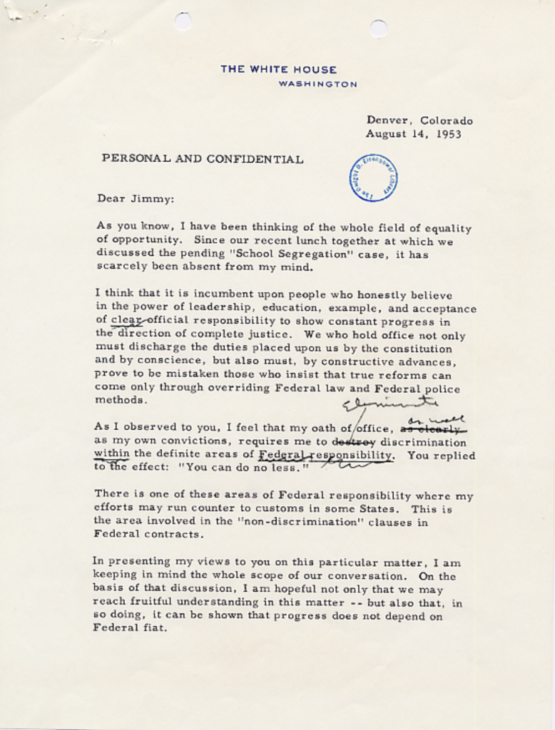 Aged typewritten letter with an official stamp and signature.