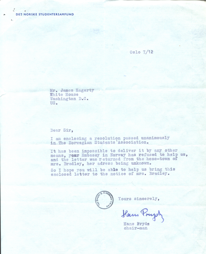 Pale blue resolution document with signatures and official stamps.