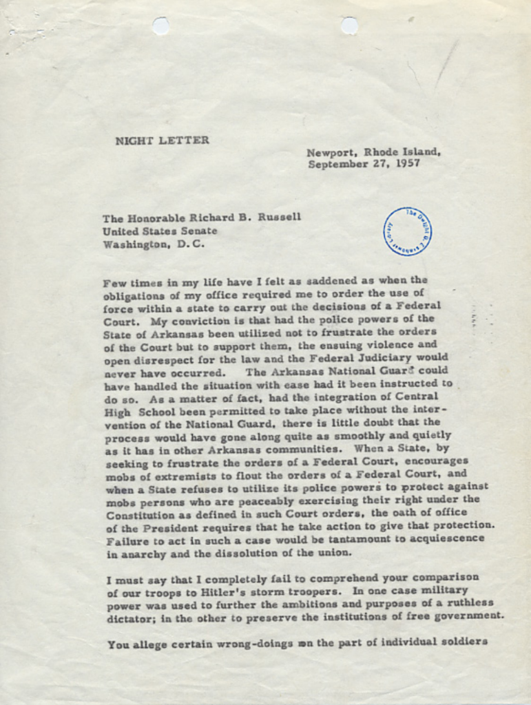 Aged typewritten letter with an official stamp.