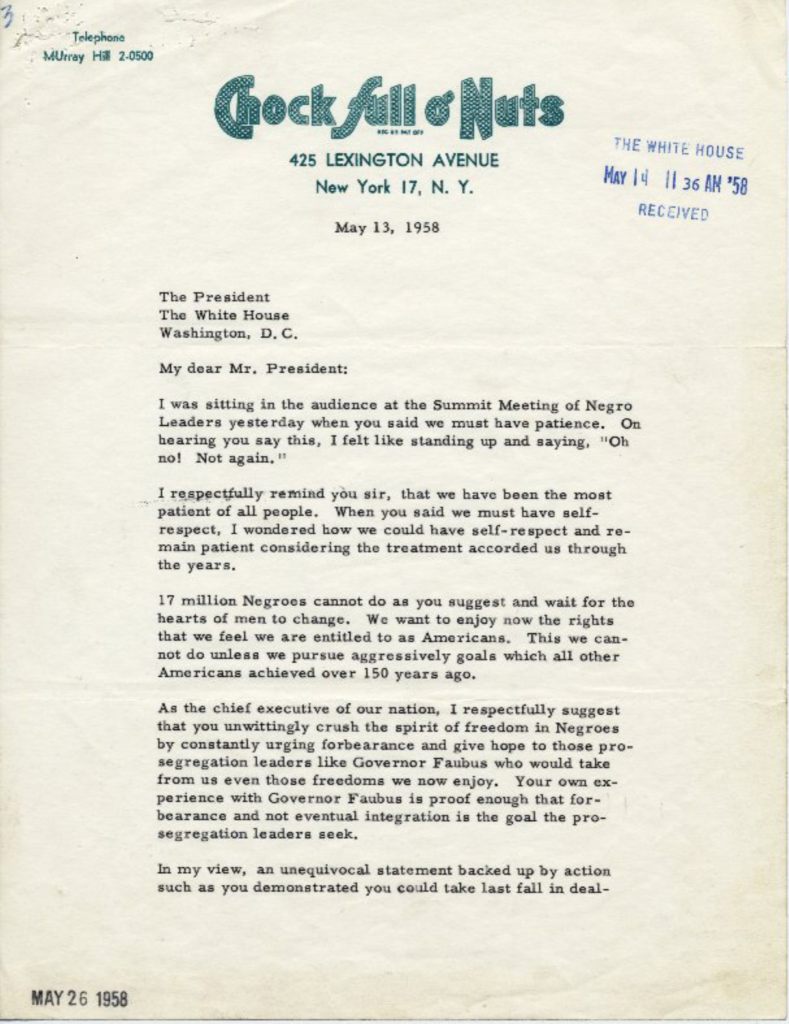 Aged typewritten letter with letterhead, stamps, and a signature.