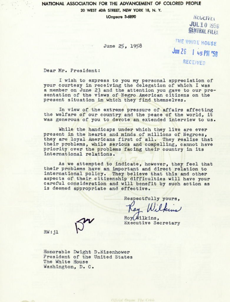 Scanned typewritten letter with official stamps and a signature.