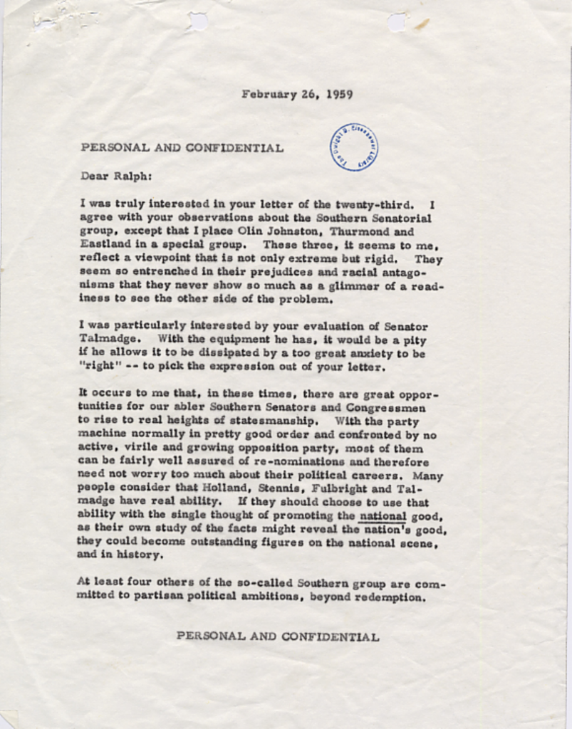 Aged typewritten letter with an official stamp and handwritten signature.