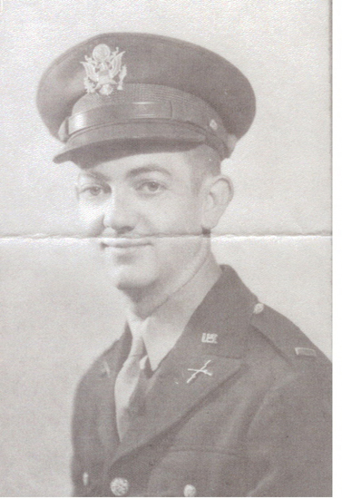 Young serviceman wearing a military uniform and peaked cap.