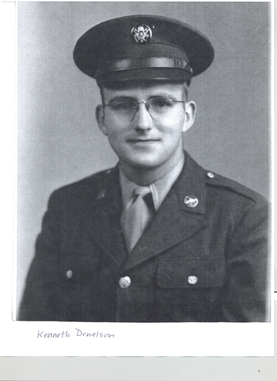 Kenneth Daniel Donelson wearing a military uniform, glasses, and peaked cap.