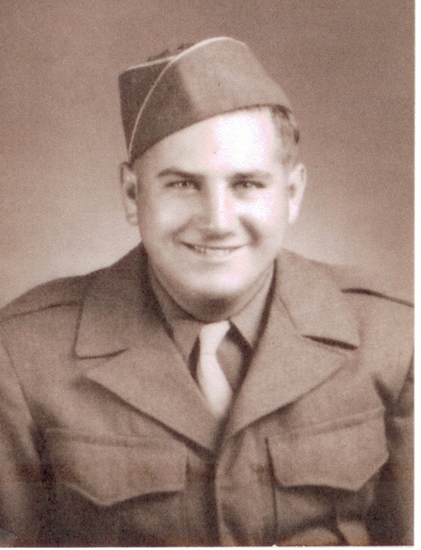 Young serviceman wearing a military uniform and garrison cap.