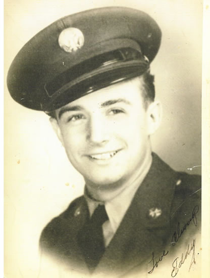 Smiling Edward J. Jalloway wearing a military uniform and peaked cap.