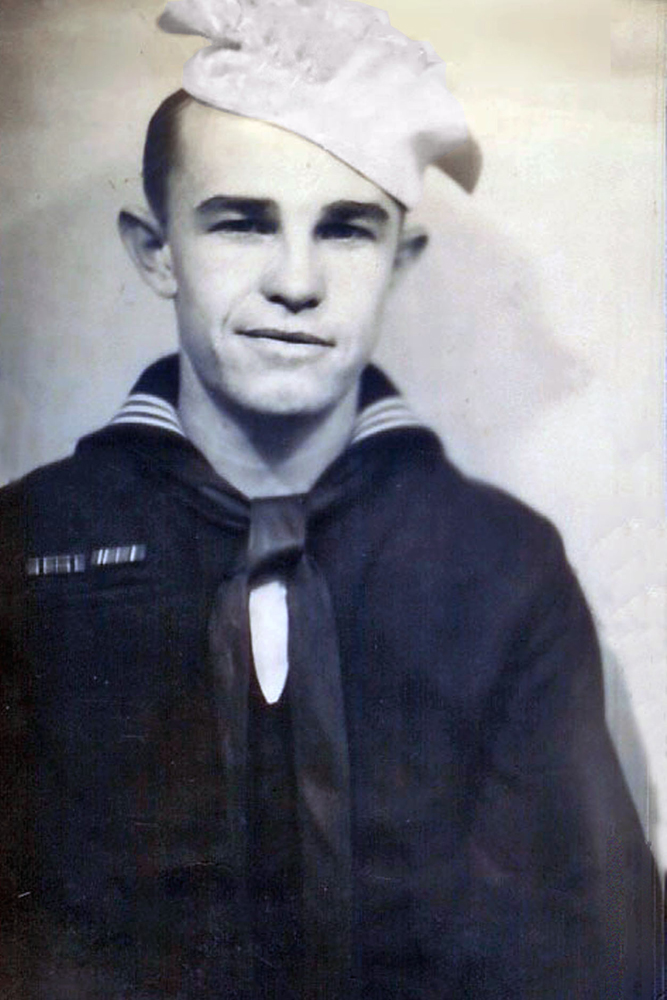 Plas Ellis wearing a dark naval uniform.