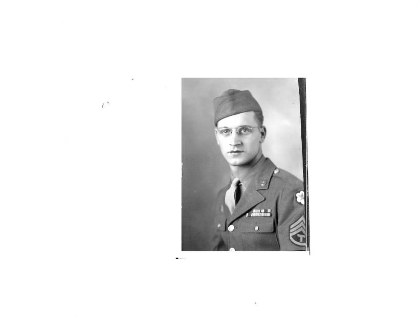 Ernest Charles Purvis wearing a military uniform and garrison cap.