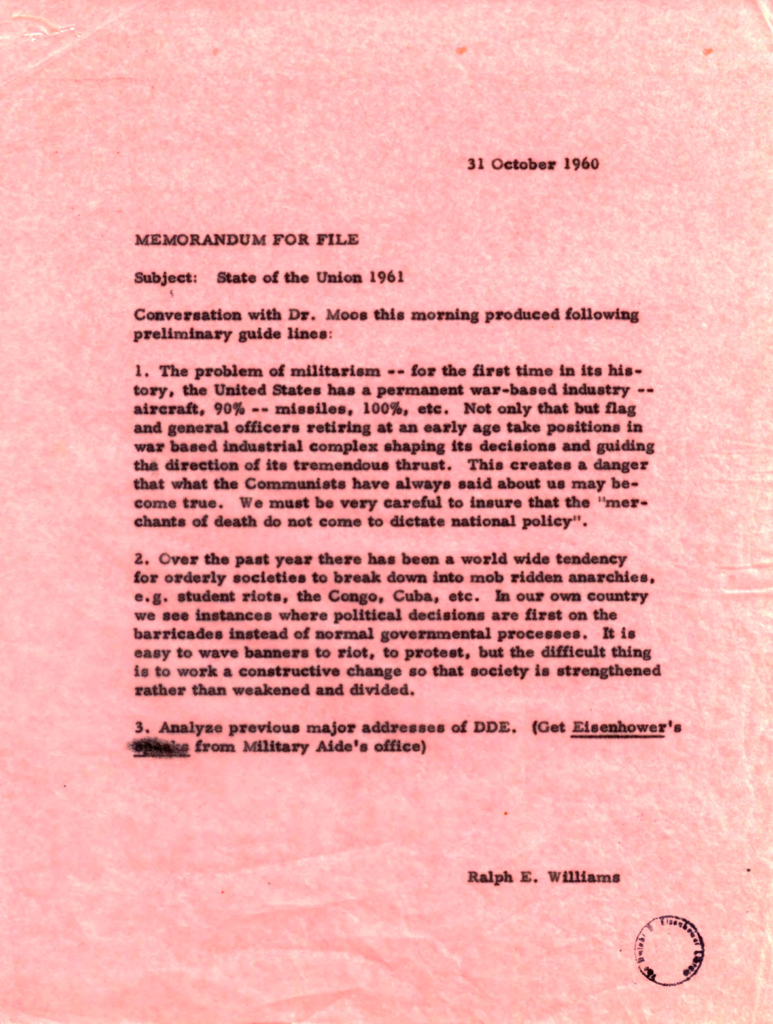 Pink memorandum with dense typewritten text and marked passages.