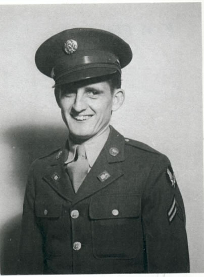 Young serviceman wearing a military uniform and peaked cap.