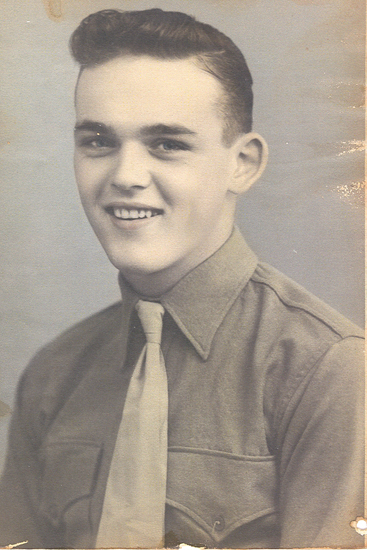 Gene Kircher wearing a military uniform.