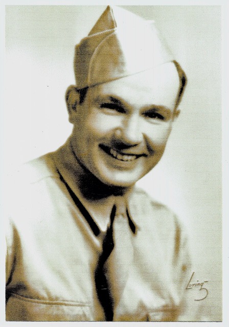 Smiling serviceman wearing a military uniform.