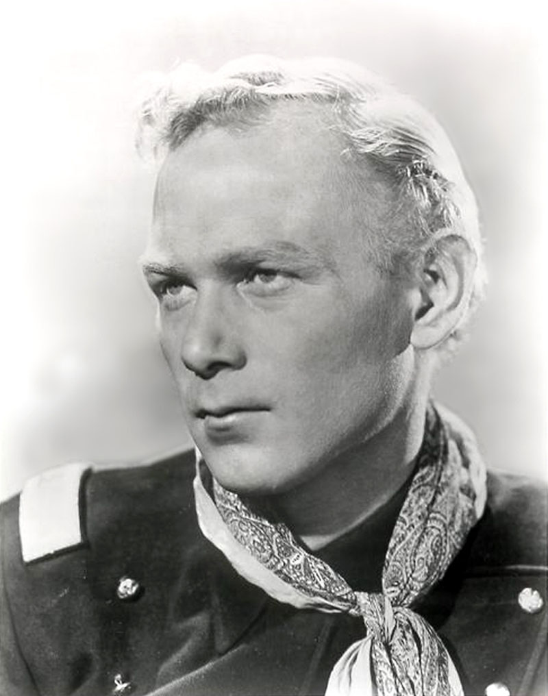 Older man shown in a close-up black-and-white portrait.