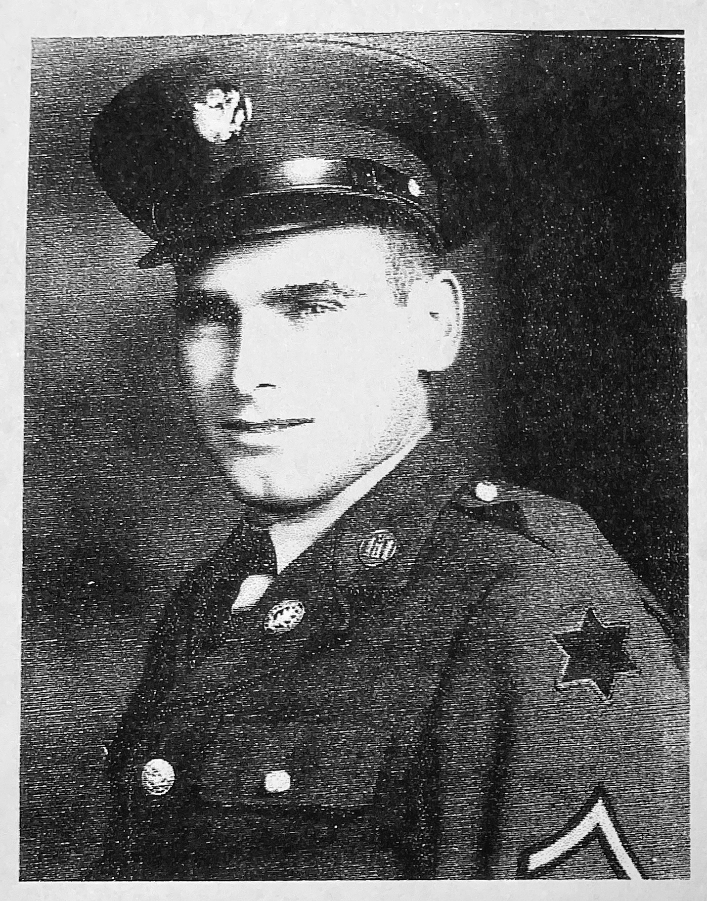 Heck, Markwood D. wearing a military dress uniform and peaked cap.