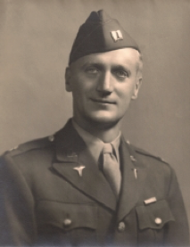 A man in military uniform with a cap.