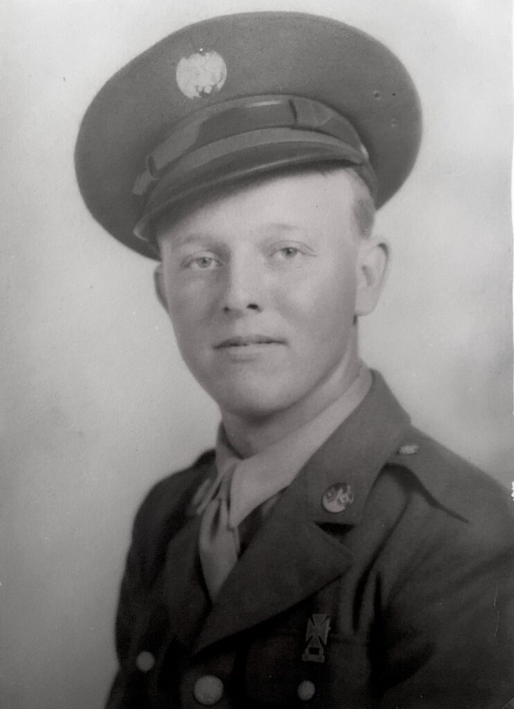 Walt Huber wearing a U.S. Army uniform and cap in 1944.