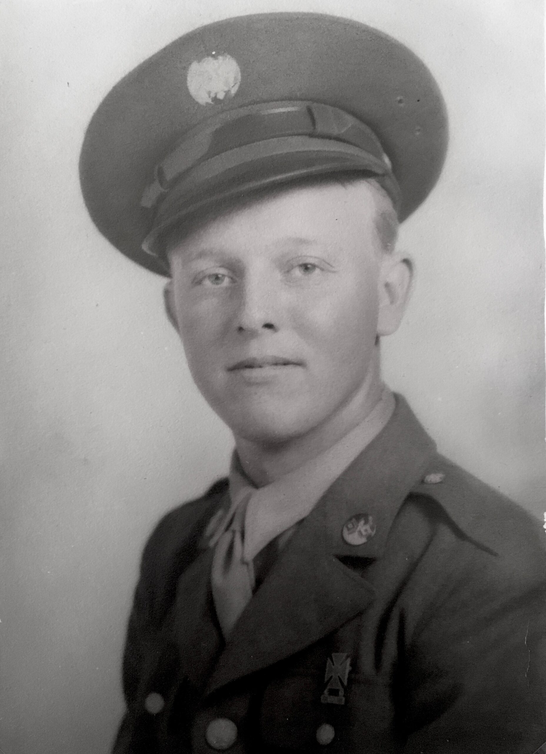 Walt Huber wearing a U.S. Army uniform and cap in 1944.