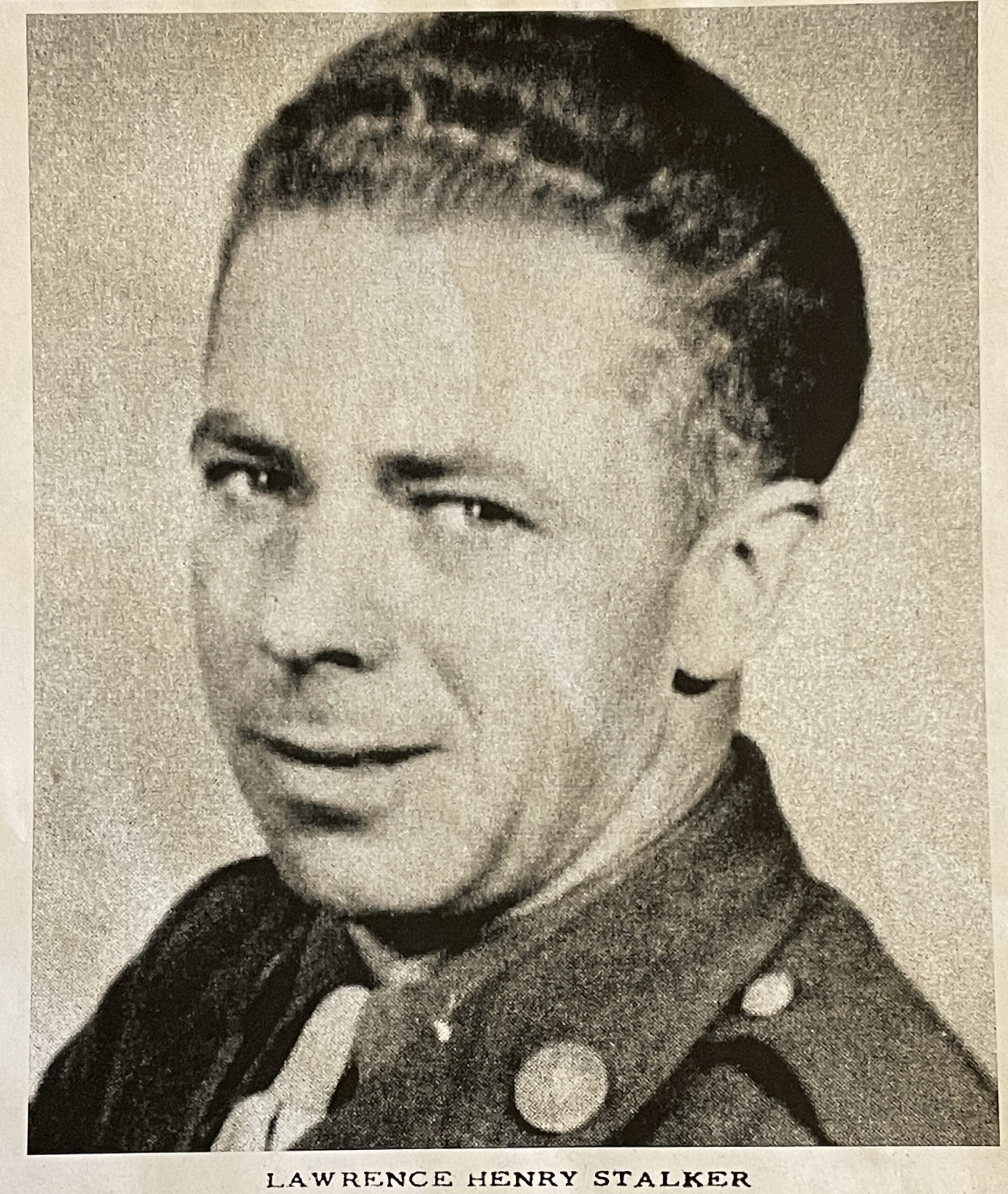 Older man shown in a close-up black-and-white portrait.