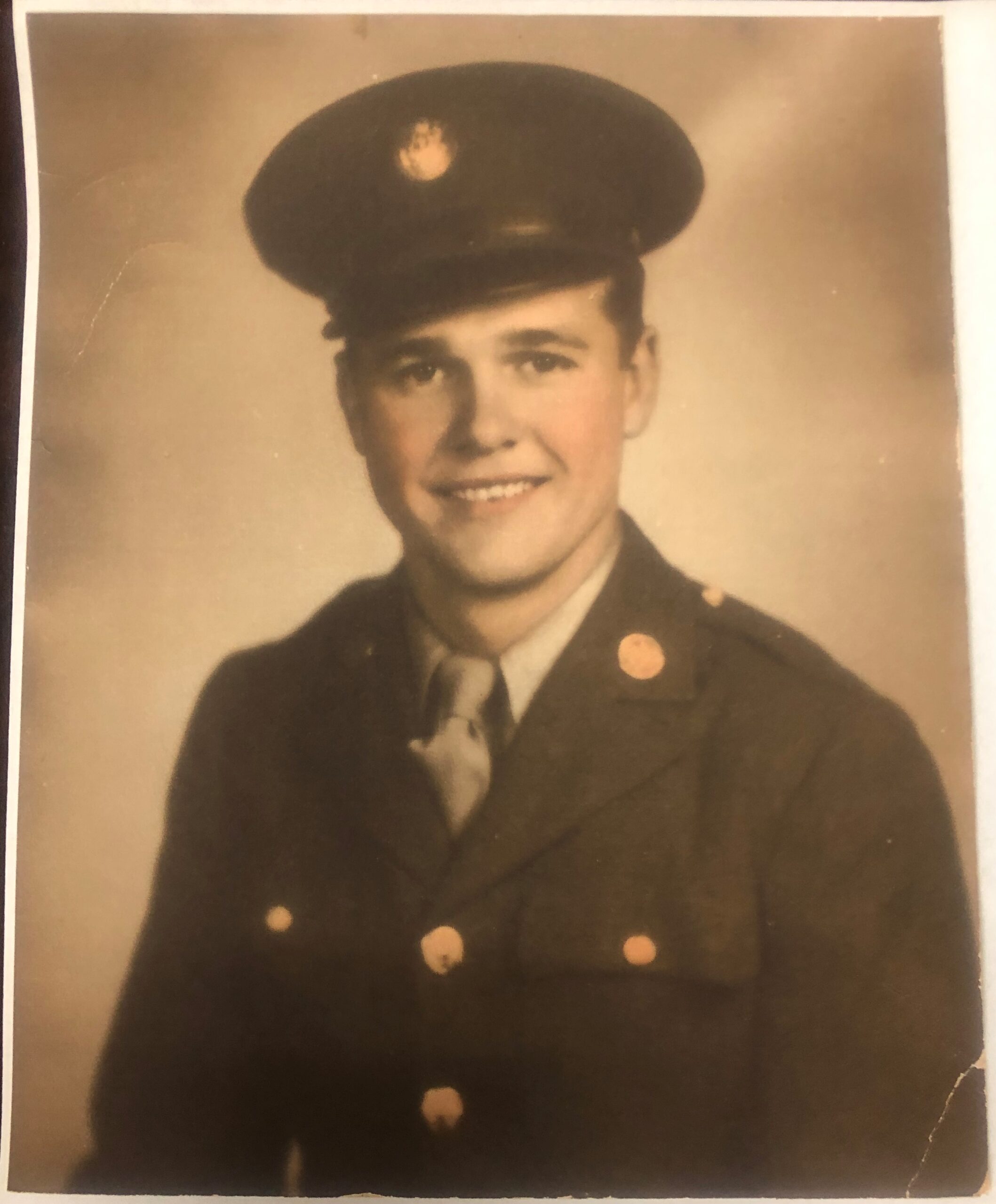 Joseph Jenkins wearing a military uniform and peaked cap.