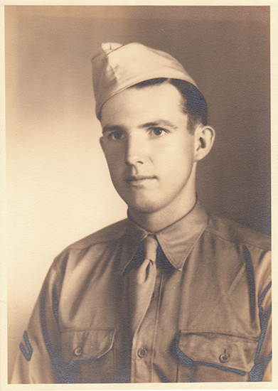 Joyce Wilbur Romberg wearing a military uniform and garrison cap.