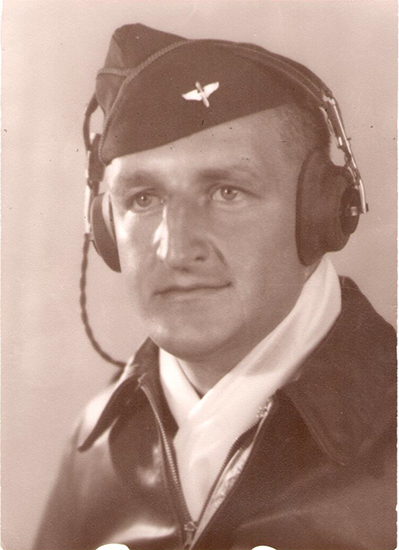 Karl Milton Funk wearing a flight helmet and headphones.
