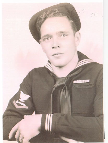Lawrence Joseph wearing a dark U.S. Navy uniform.