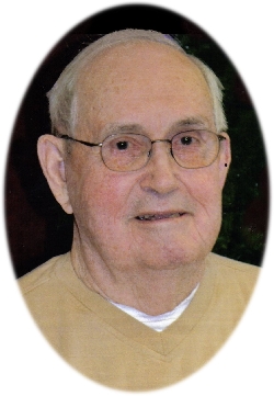 Older Leland Ewalt wearing glasses in a close-up color portrait.